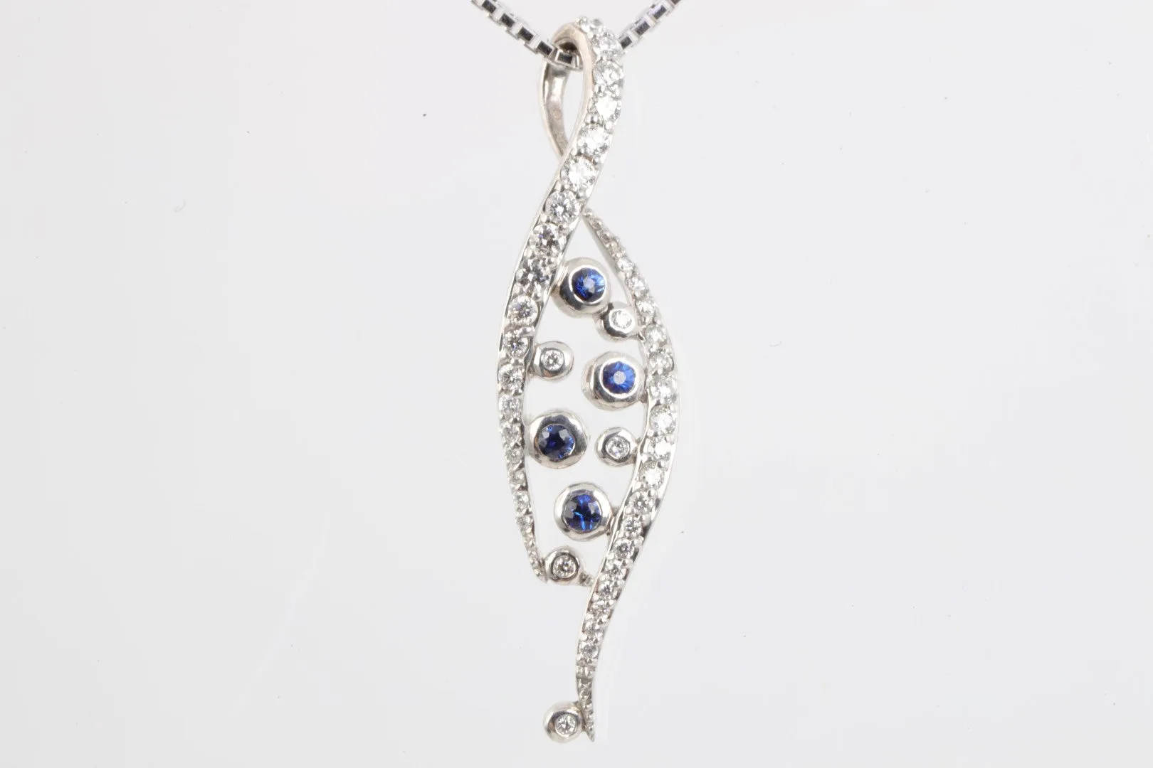 16" 18k White Gold 0.13tcw Sapphire 0.60tcw Diamond Necklace (4.96g.)