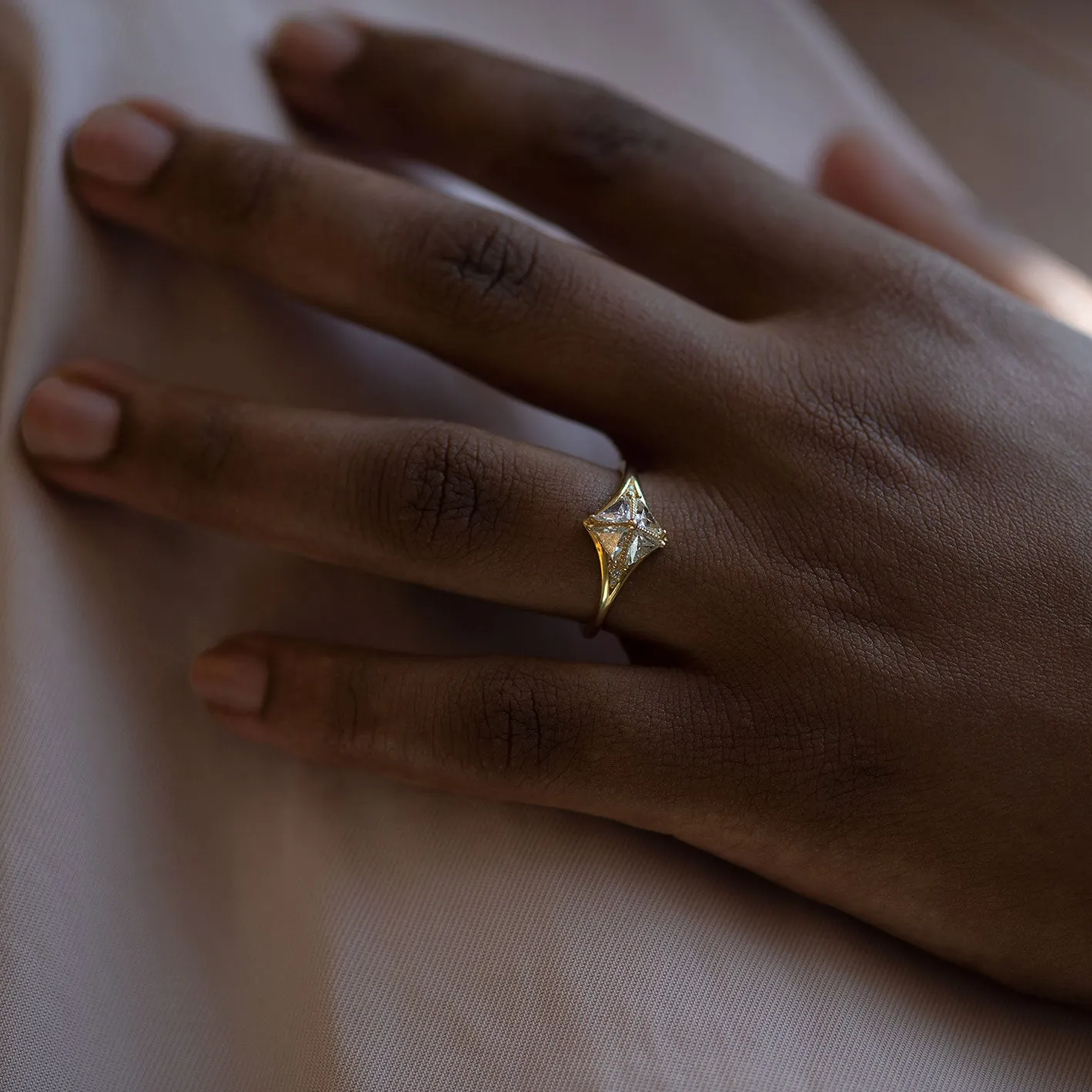 Detailed Star Engagement Ring with Triangle Diamonds