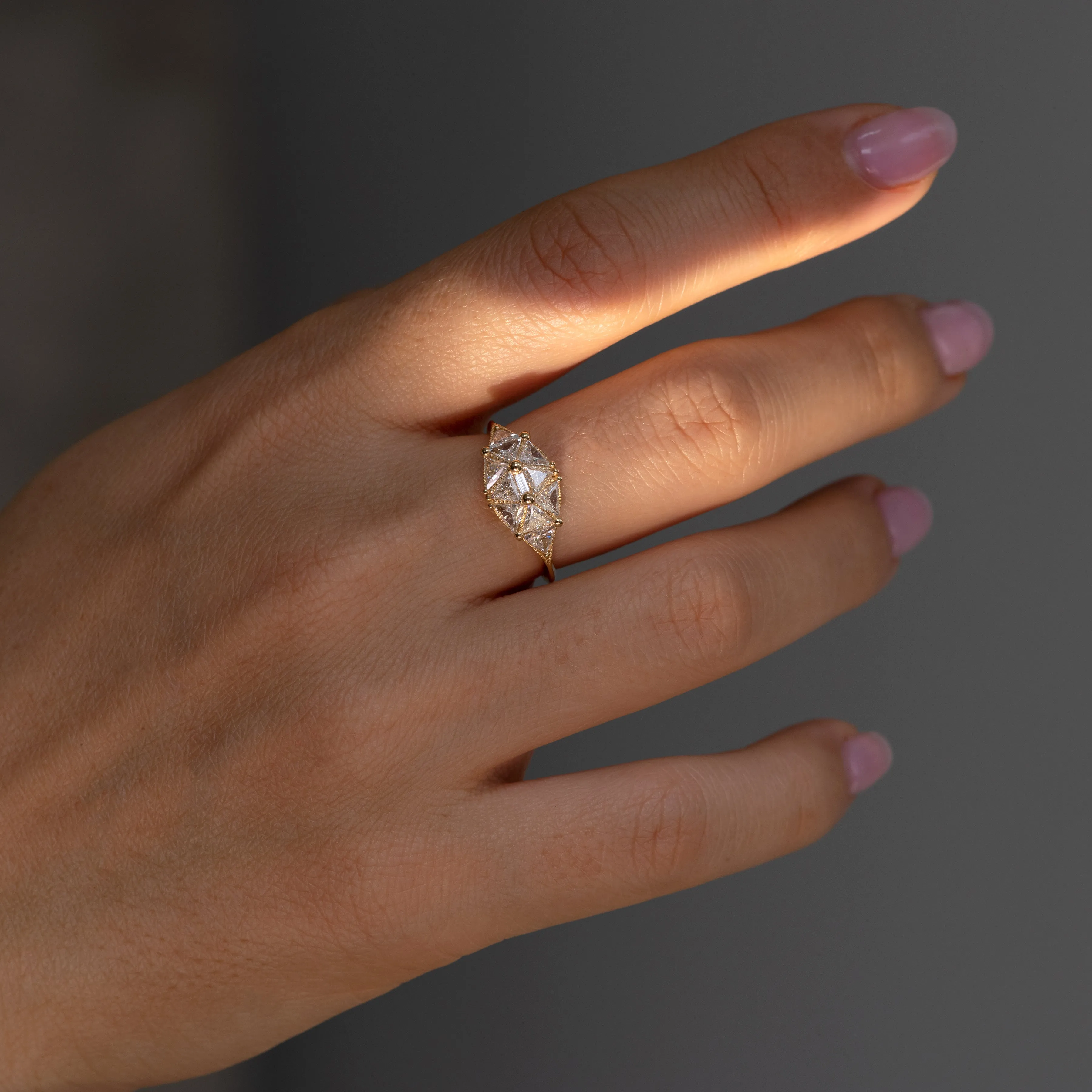 Reflective Dome Ring with Ten Triangle Cut Diamonds