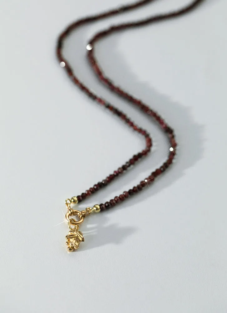 Rosie garnet necklace with front lock 14k gold