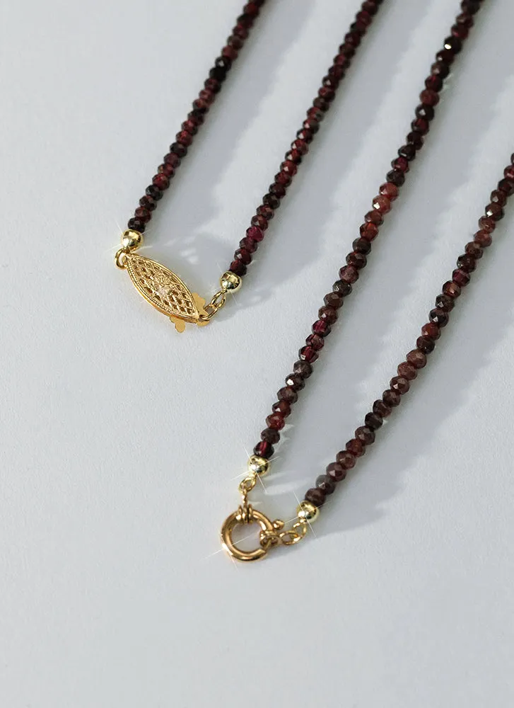 Rosie garnet necklace with front lock 14k gold