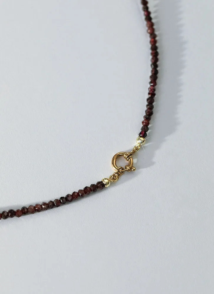 Rosie garnet necklace with front lock 14k gold