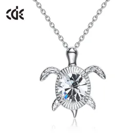 Sterling silver swimming white crystal turtle necklace