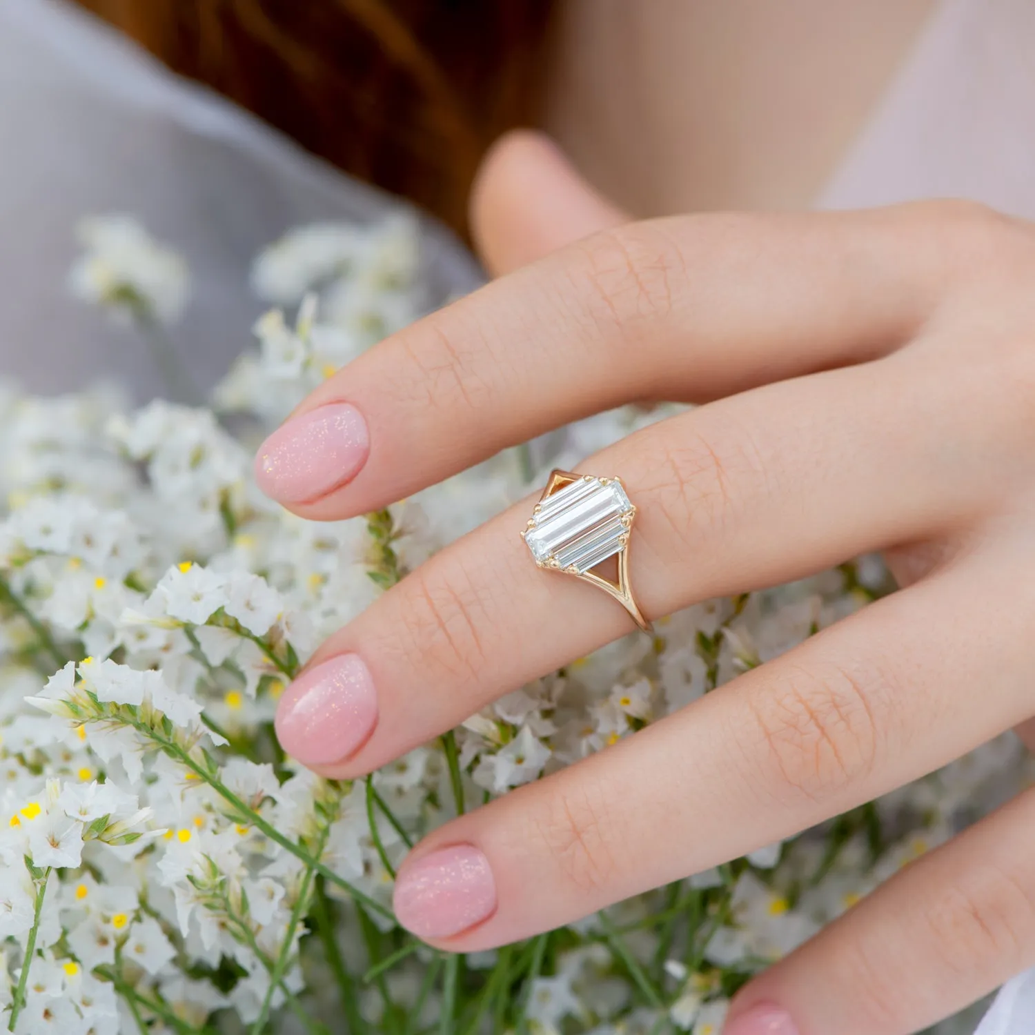 Symmetry Engagement ring with Five Baguette Cut Diamonds