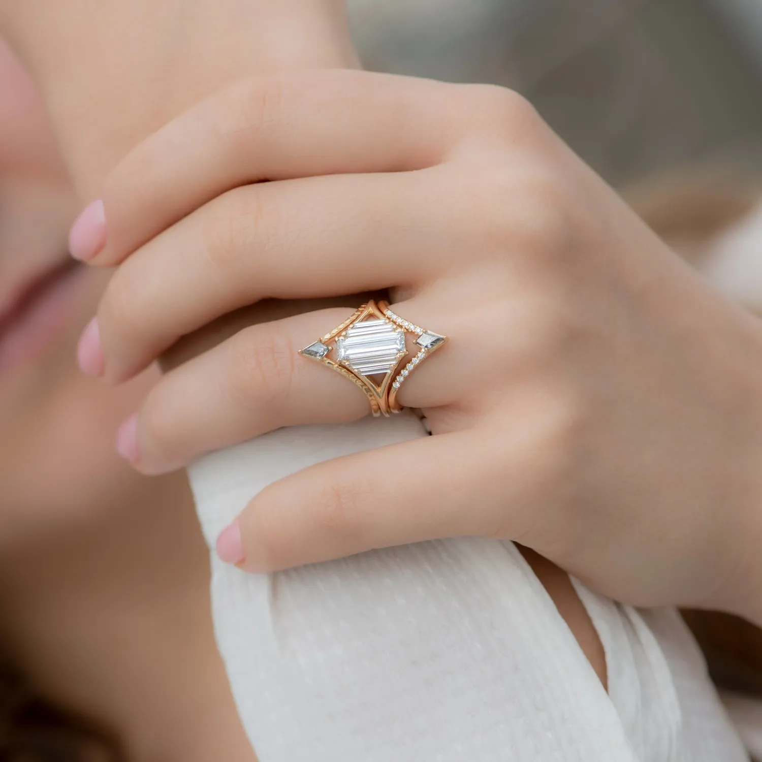 Symmetry Engagement ring with Five Baguette Cut Diamonds