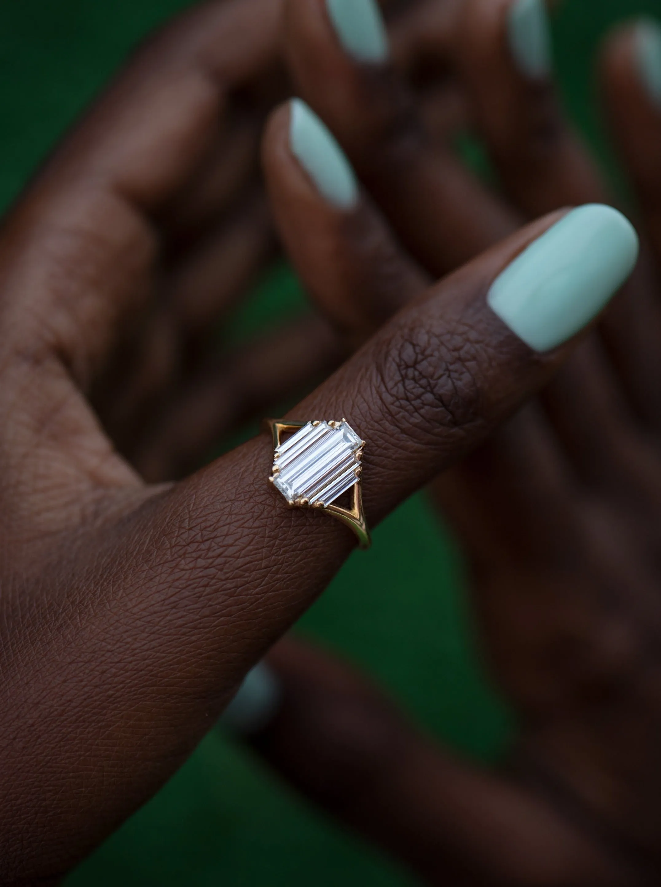 Symmetry Engagement ring with Five Baguette Cut Diamonds